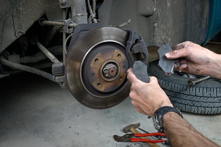 brake pads being replaced