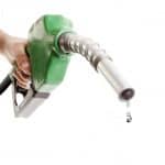 How to Save Up to 25% of Your Car’s Fuel Bills hand holding a fuel pump