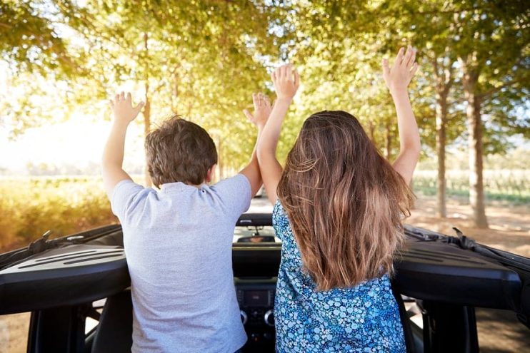 children on a road trip