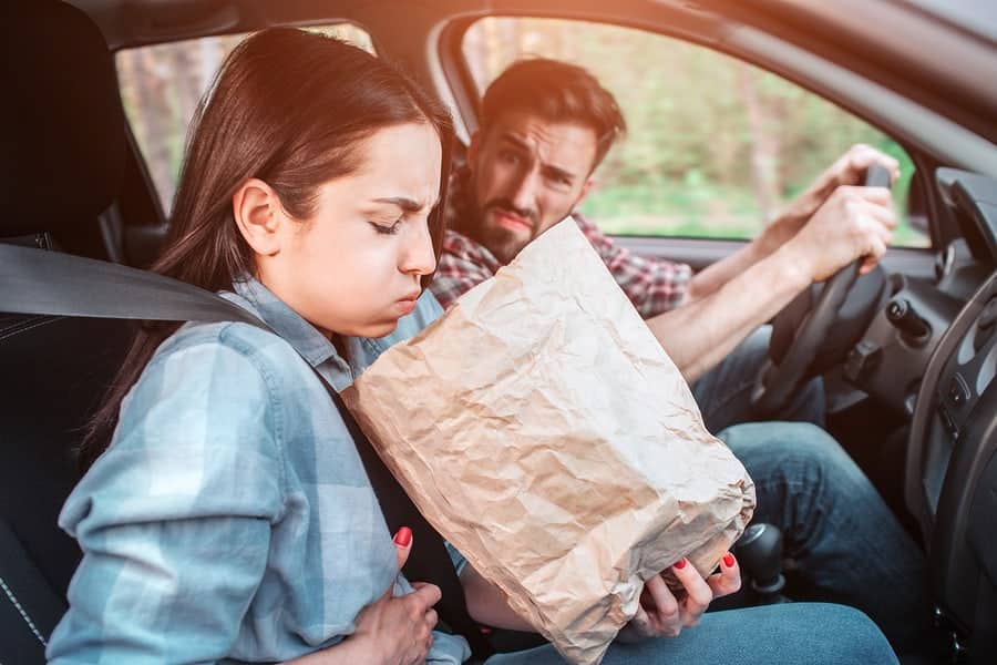 woman suffering from travel sickness