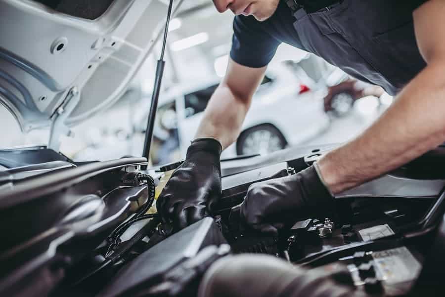 mechanic working on a car