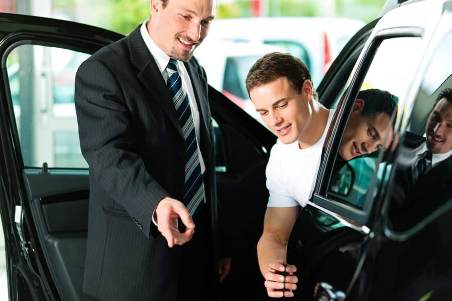 customer inspecting a car