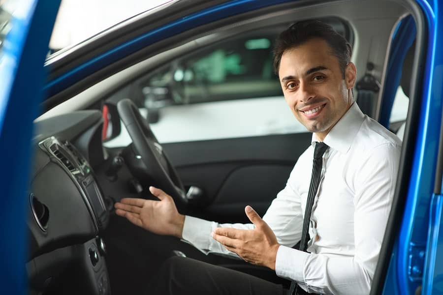 car salesman using sales tactics