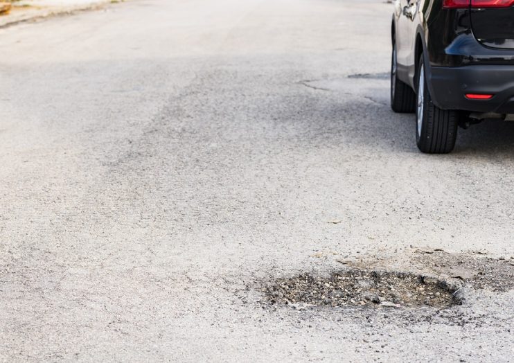 pothole in the road