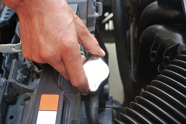 checking and topping up a radiator