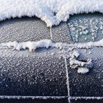Frozen Car. The Side Of The Car, Doors And Handles Covered With