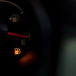 Empty Fuel Warning Light In Car Dashboard. Fuel Pump Icon. Gasol