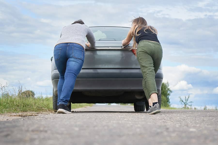 pushing a car after running out of fuel