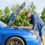 The Sad Disappointed Man Standing Near The Car With Opened Hood,