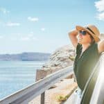 Cheerful Woman Portrait Enjoying The Seaside Road Trip. Dressed