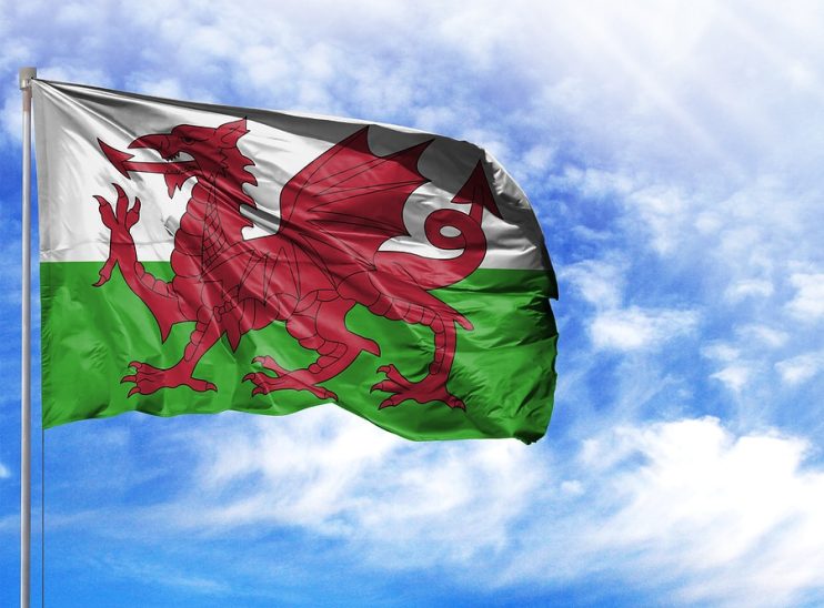 flag of Wales flying on a pole