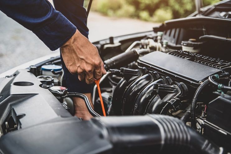 mechanic carrying out vehicle maintenance