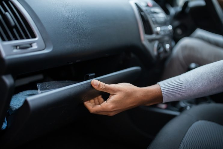 opening a glove box latch