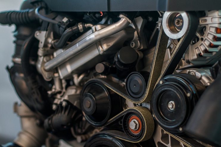 serpentine belts routing through pulleys