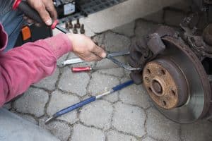 Nine signs and symptoms of a bad brake caliper and how to fix it