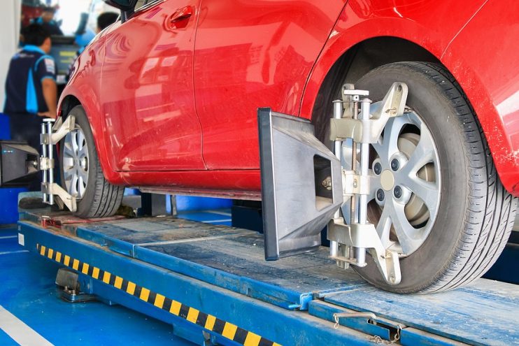 Wheel alignment to correct vehicle pulling