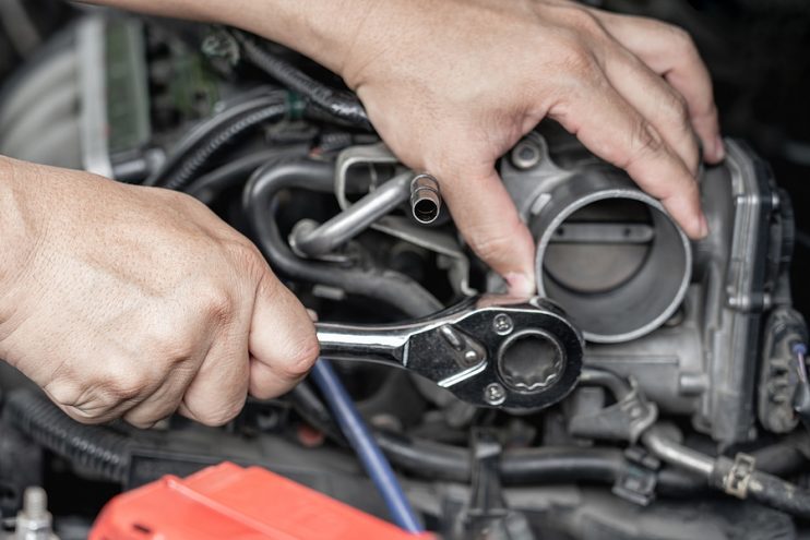 unbolting a throttle body