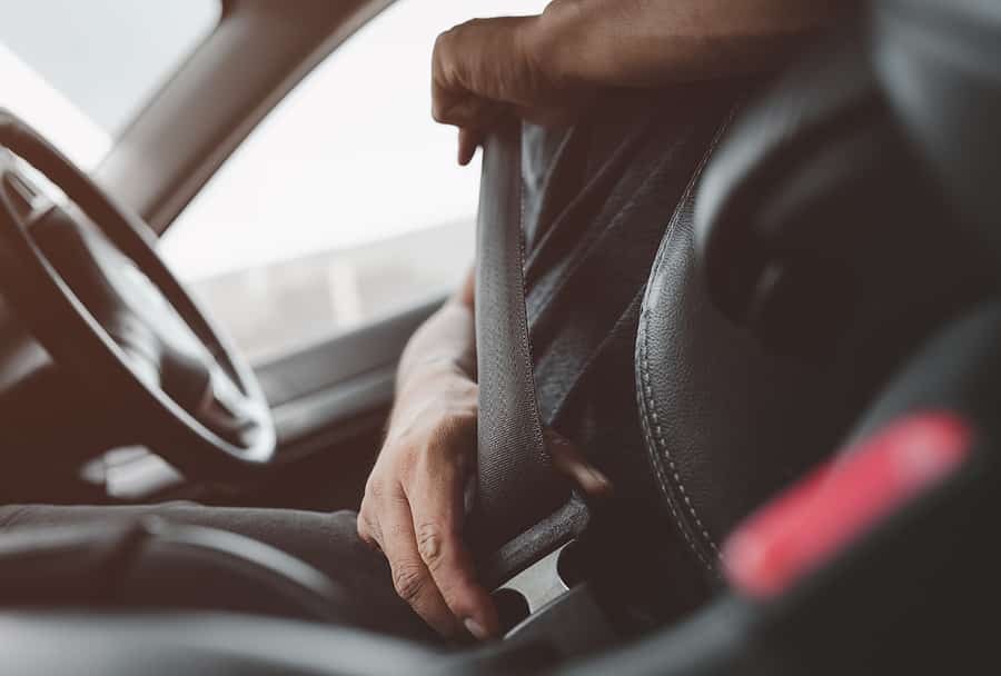 fastening a seat belt