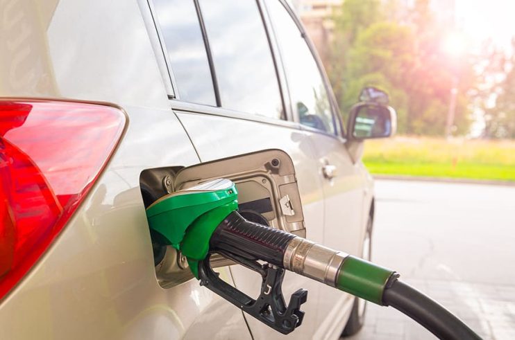 refueling a car at the pumps