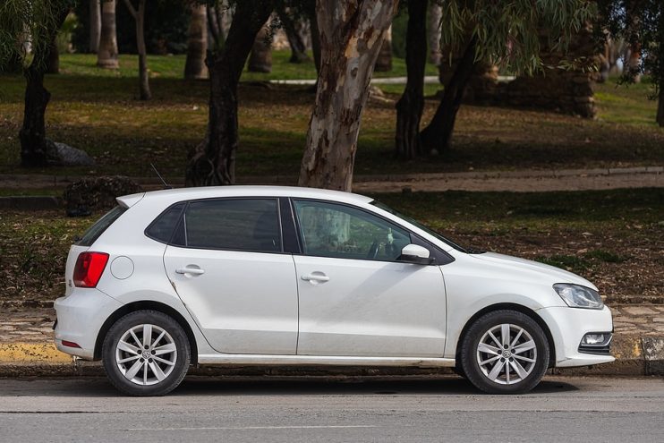 side view of white VW Polo