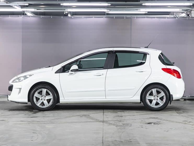 Side view of white Peugeot 308