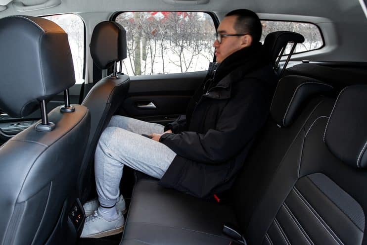 Dacia Duster interior with person sat inside
