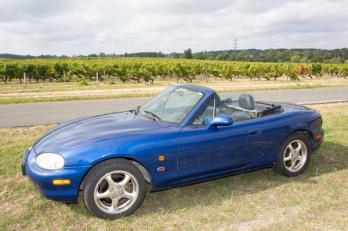 Blue Mazda MX-5 side view