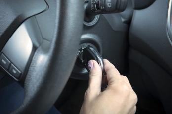 turning a key to start a car