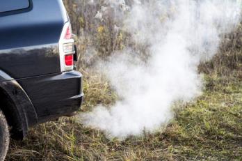 smoke fumes coming from a car exhaust